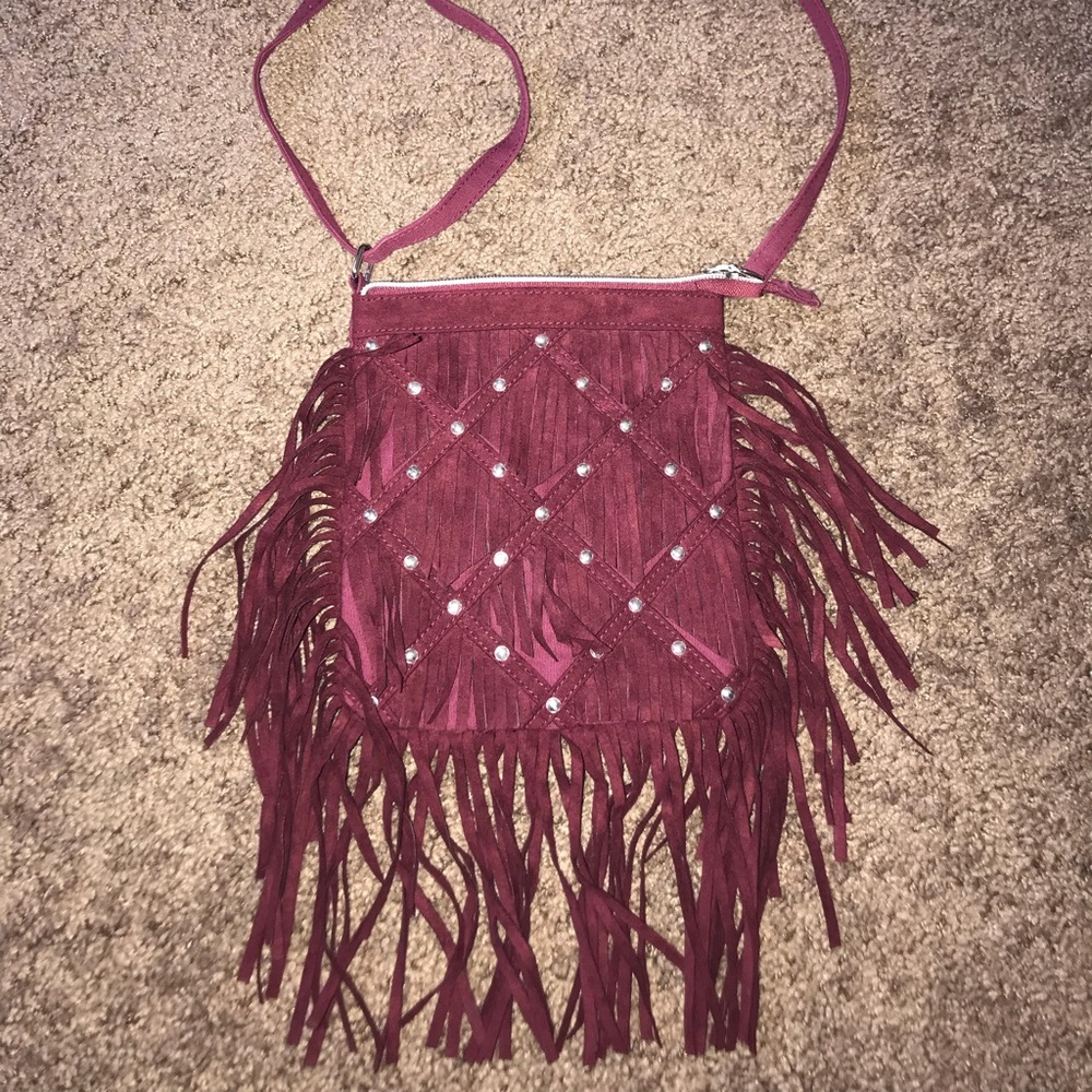 Cute Maroon fringe Justice bag!
